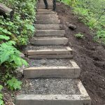 Wooden steps and gravel fill on an Ozone crag trail